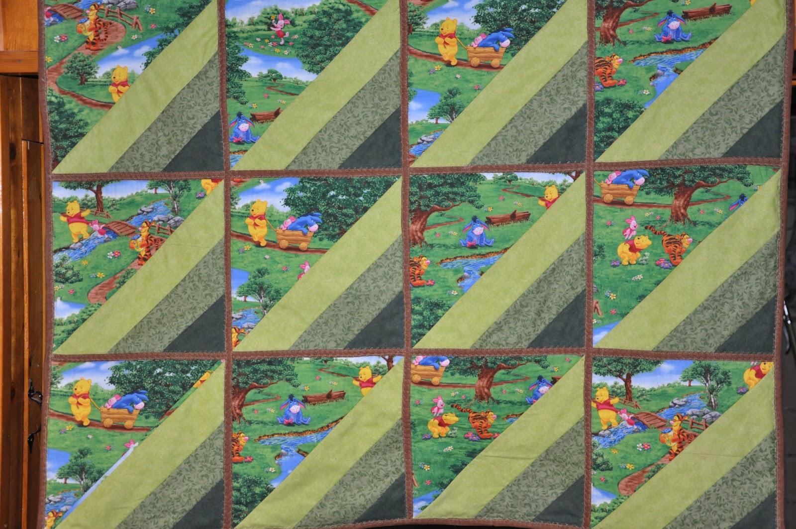 Pondering Cat Reversible Echoing Baby Quilt using the QuiltasYouGo