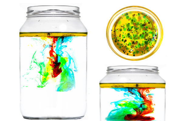 Explore liquid densities with this fun & magical experiment for kids!  My girls loved making fireworks in a jar and used this activity for their science fair project, too! #scienceactivities #scienceactivitiesforkids #fireworksinajar #fireworksinabottle #fireworkscraft #scienceexperimentskids #scienceforkids #sciencefairprojectsforelementary #sciencefairprojects