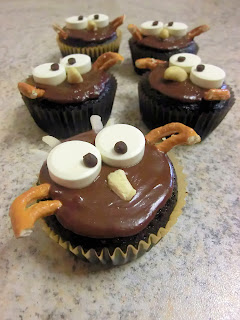 Halloween themed Hoot owl pumpkin chocolate muffins or frosted cupcakes