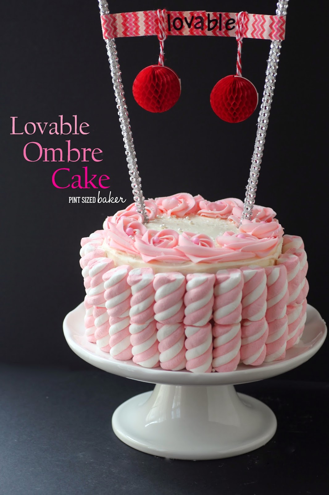 Lovable Ombre Cake 1 I think that this Lovable Ombre cake would look so cute at a Valentine's Day tea party! The pink layers inside would look so pretty for the party!