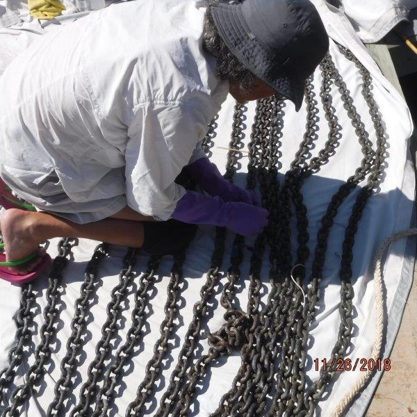 Chip & Debbie Willis on s\v Elegant'sea Marking our anchor chain with