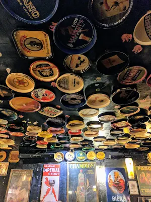 Trays on the ceiling at Delirium Cafe on a 4 hour layover in Brussels