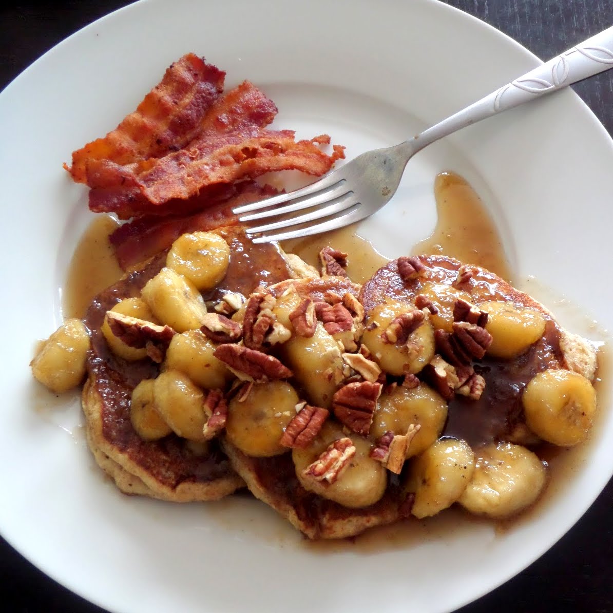 Bananas Foster Pancakes:  Whole wheat pancakes topped with sweet bananas in syrup.