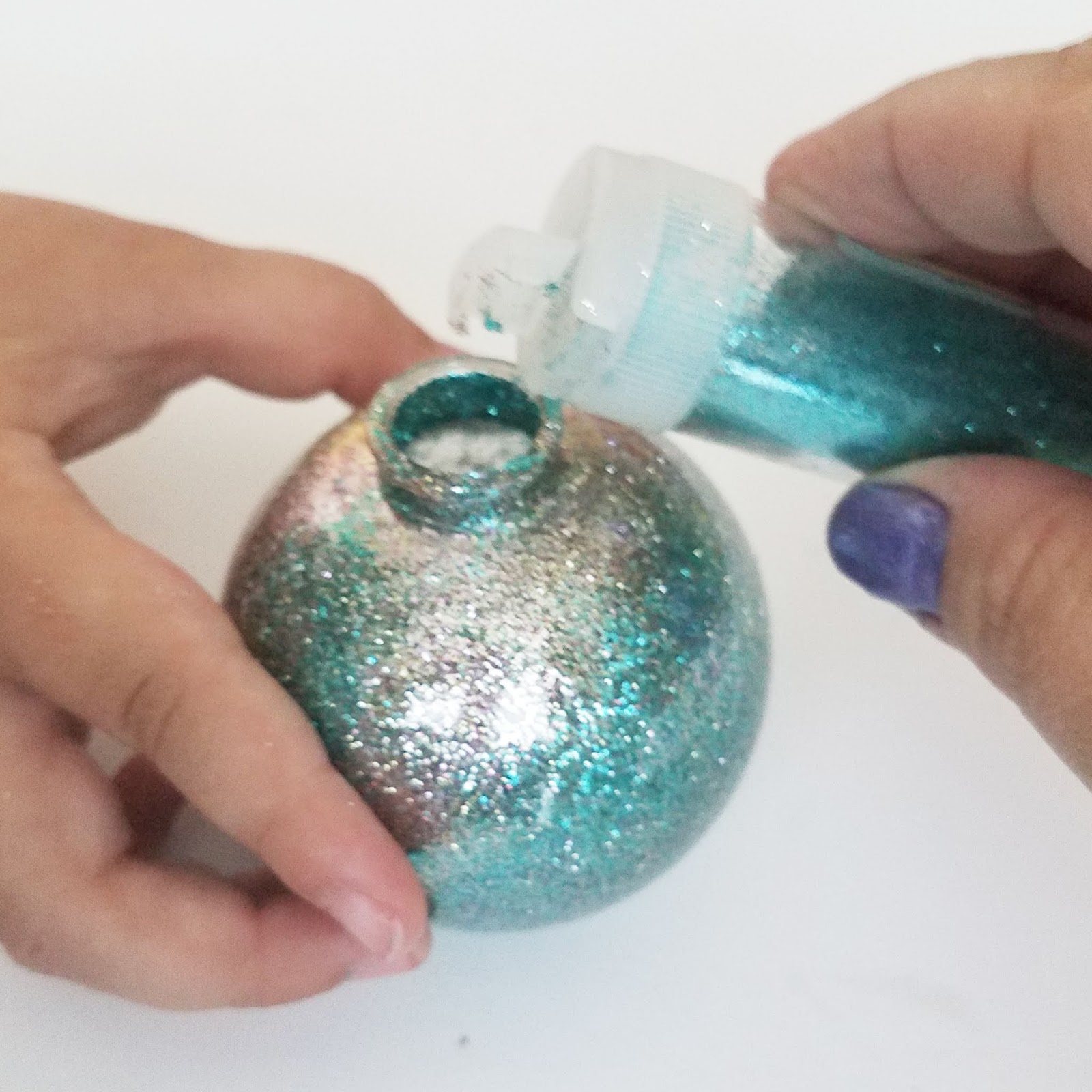 Erin Reed Makes 3 DIY Glitter Ornament Balls Using Dollar Tree