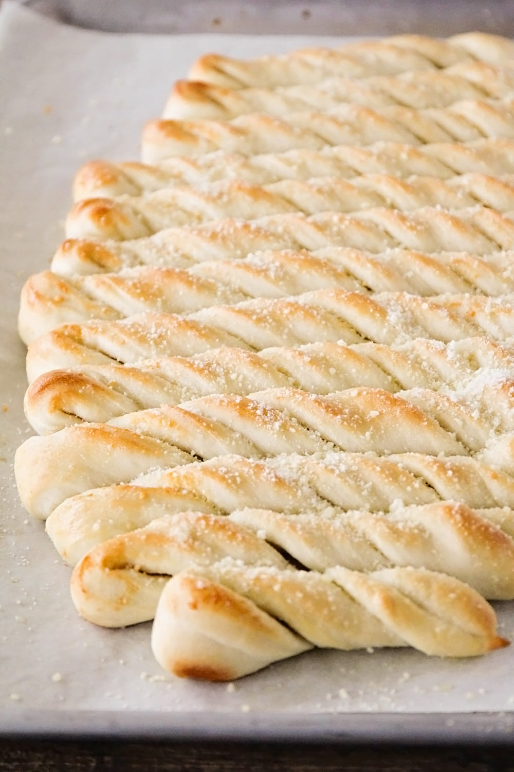 These garlic parmesan breadsticks are addictingly delicious, and ready in under 45 minutes!