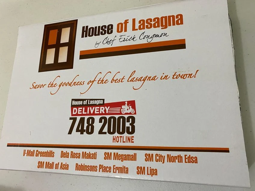 Baked lasagna in a secure box packaging from House of Lasagna