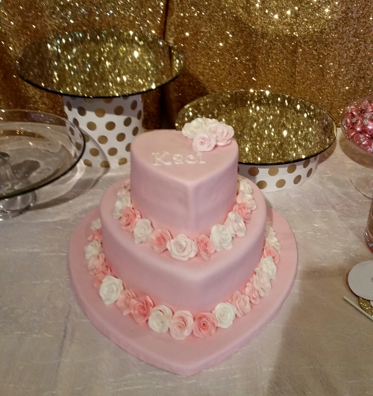 MyMoniCakes: Pretty in pink baby shower cakes. Onesie cake, heart shaped cake.