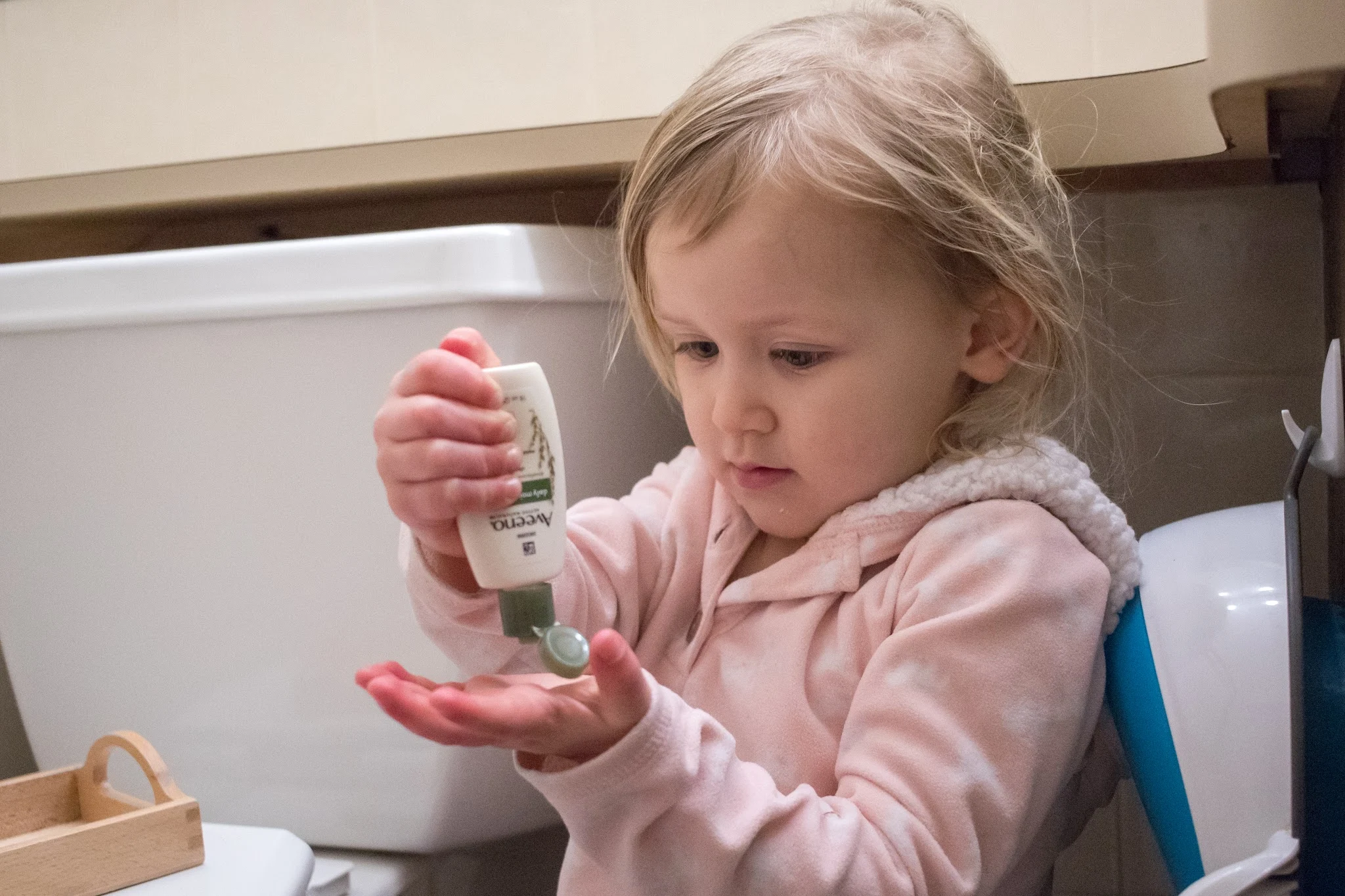 Montessori self-care: some lotion and chap-stick on a tray is perfect for toddlers all winter long
