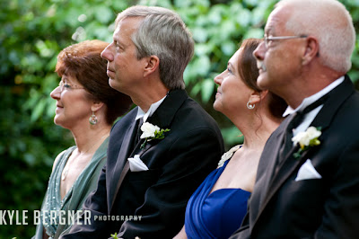 Parents watching the ceremony in the garden at Chase Court