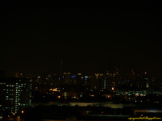 Lights out on KLCC Twin Towers and KL Tower during Earth Hour 2012