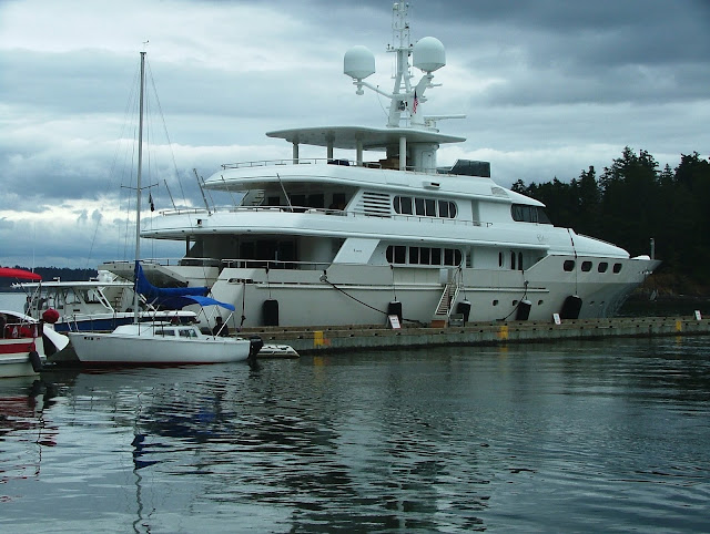 Mega Yacht taking all of transient dock at Friday Harbor on 4th of July