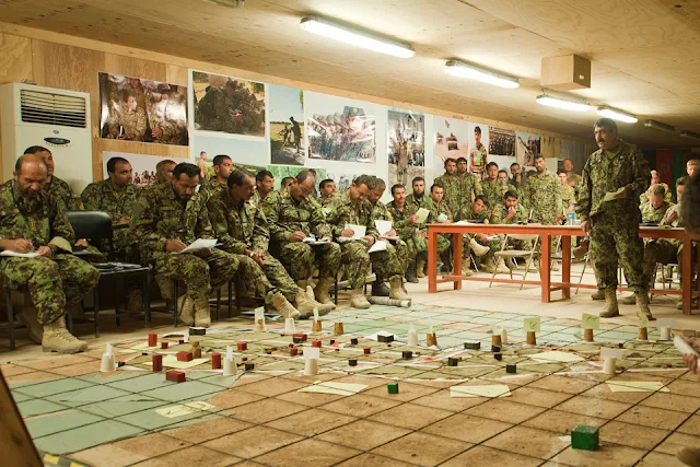 Image Attribute: Afghan soldiers during the planning of a major Afghan-led operation in Helmand province (library image) [Picture: Corporal Jamie Peters, Crown copyright]