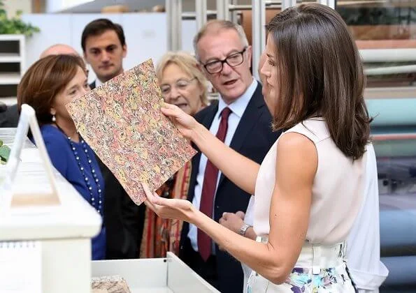 Queen Letizia wore Adolfo Dominguez floral print dress and Hugo Boss silk blouse, and Steve Madden pumps