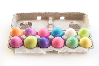 dyed Easter eggs in egg carton