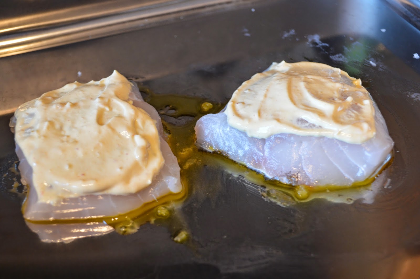 Spoon the mustard mix onto the fish