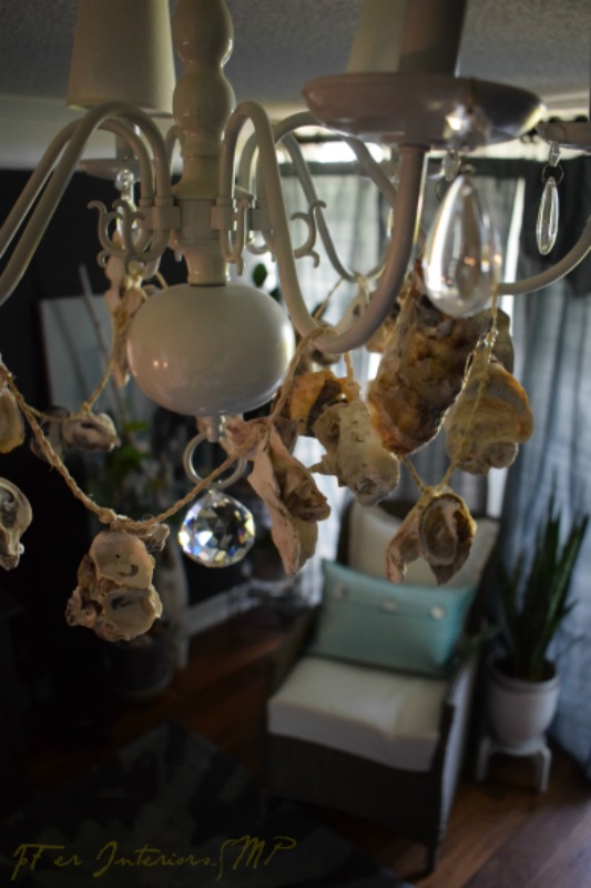 Chic,Thrifty,D.I.Y ideas for decorating a chandelier, using oyster shells and crystals