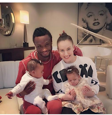 Photo: Mikel Obi with his girlfriend and their twin girls
