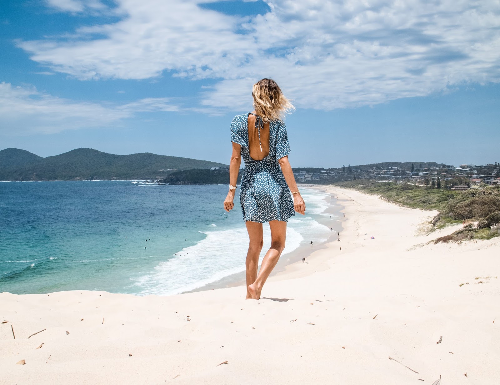 Travel Blogger, Alison Hutchinson, at one mile beach in Forster Australia