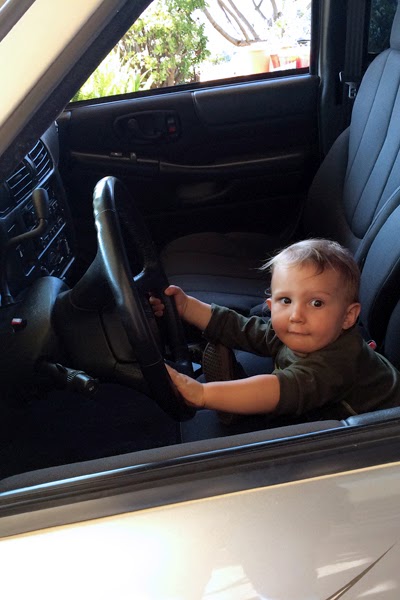 Reef Loves to 'drive' Opa's new used truck.