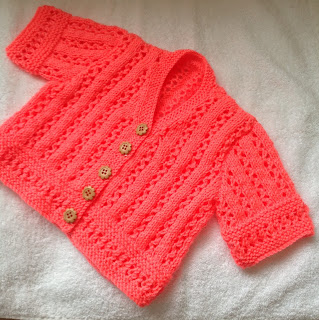http://www.craftsy.com/pattern/knitting/clothing/summer-bright-short-sleeve-girl-cardigan/212606