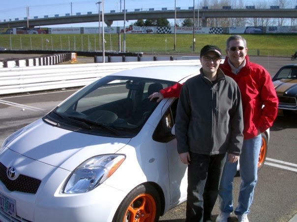 My dad and me with my 2007 Yaris