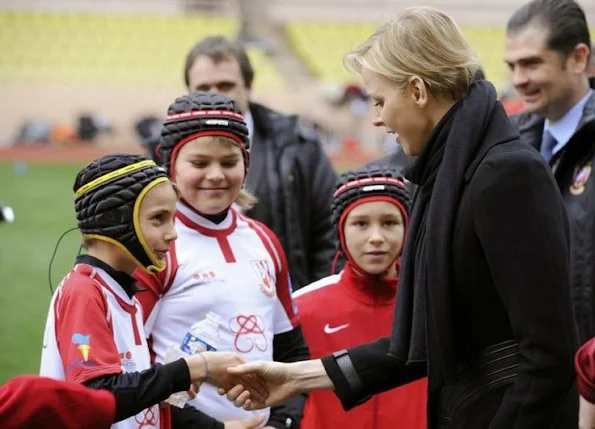 Princess Charlene attended the Sainte Devote rugby tournament match at the Louis II Stadium in Monaco