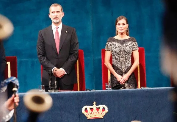 King Felipe and Queen Sofia at Princess of Asturias Awards 2018 ceremony. Queen Letizia wore Felipe Varela dress and Magrit pumps