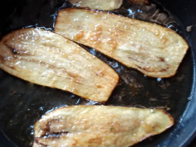 Sauté the eggplant slices until light golden brown
