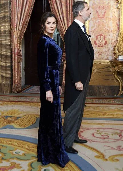 Queen Letizia wore a blue velvet gown by Spanish fashion house Felipe Varela, which she prefers to wear at these kind of events. aquamarine earrings