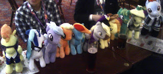 Plushies lined up in Wetherspoons