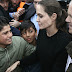 ANGELINA JOLIE MOBBED BY MEDIA AT THE EXILE CAMPS IN GREECE - HOLLYWOOD NEWS