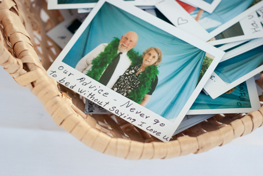 Leave a poloroid camera on a table for guests to take a picture of 