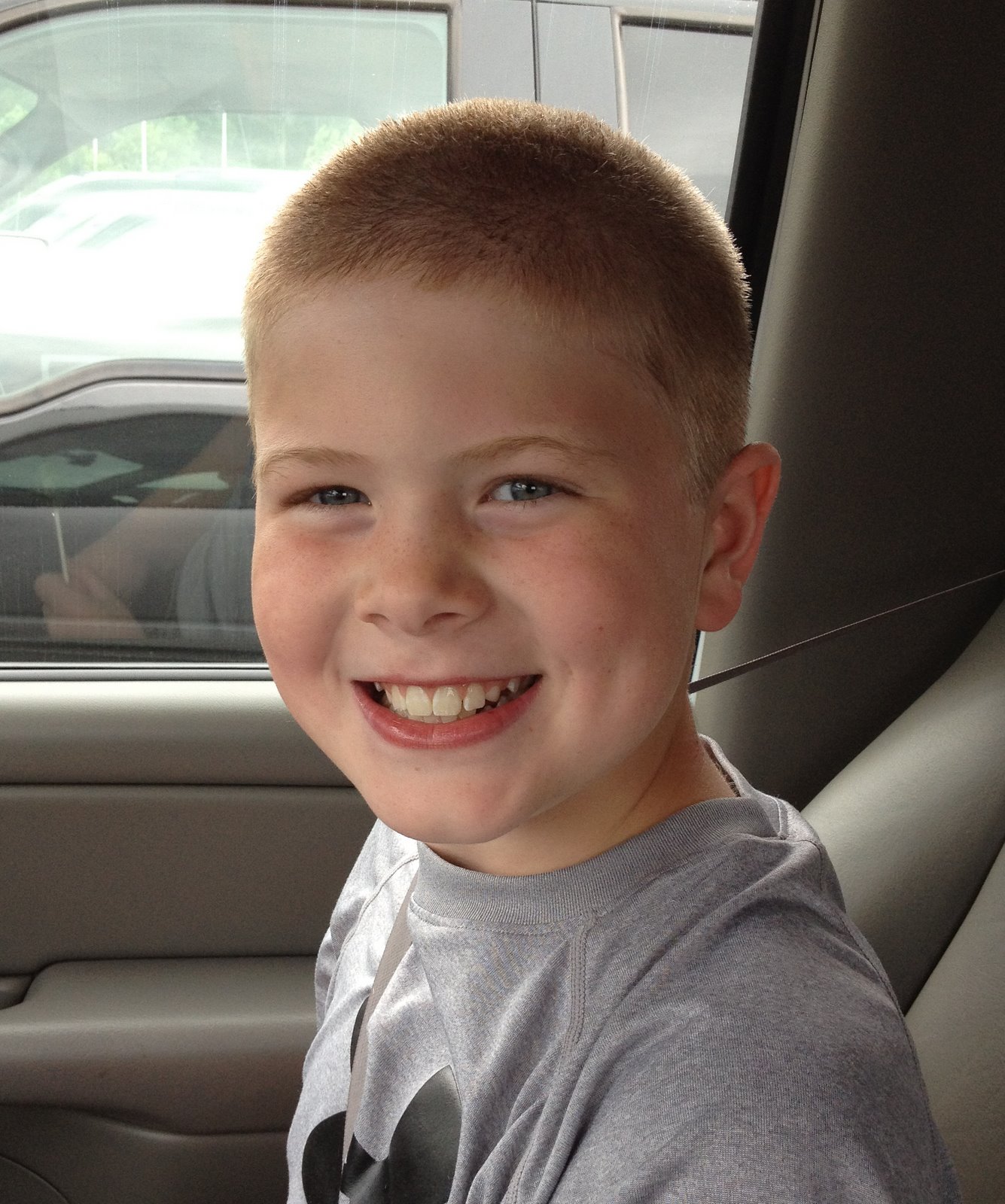 a blonde and 3 boys Summer Haircuts...