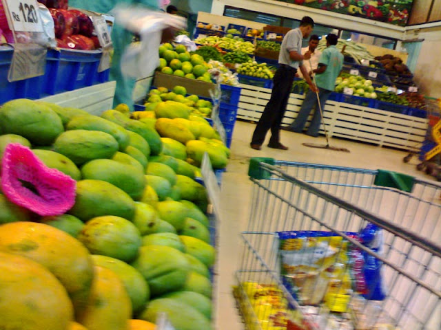 fruits and vegetables being sold in supermarket