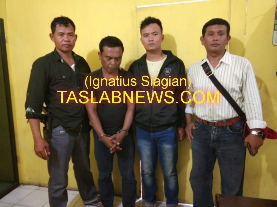 Tersangka Imran C Manurung alias Pudik saat diamankan di Polsek Tanjungbalai Selatan. Tersangka Imran C Manurung alias Pudik saat diamankan di Polsek Tanjungbalai Selatan.