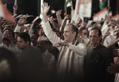 Rajiv Gandhi lookalike waves to the crowd during a rally in Madras (now Chennai), Madras Cafe, Directed by Shoojit Sircar 
