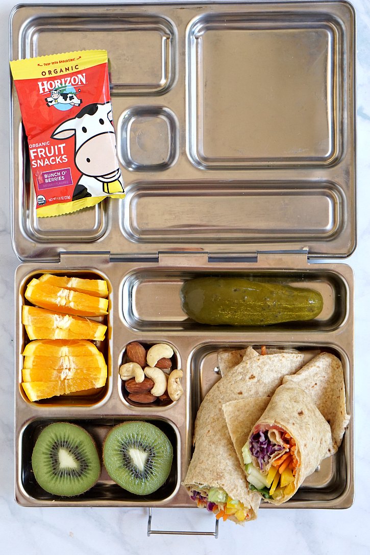 Rainbow tortilla wrap Colorful lunch box packed with a rainbow veggie tortilla wrap.