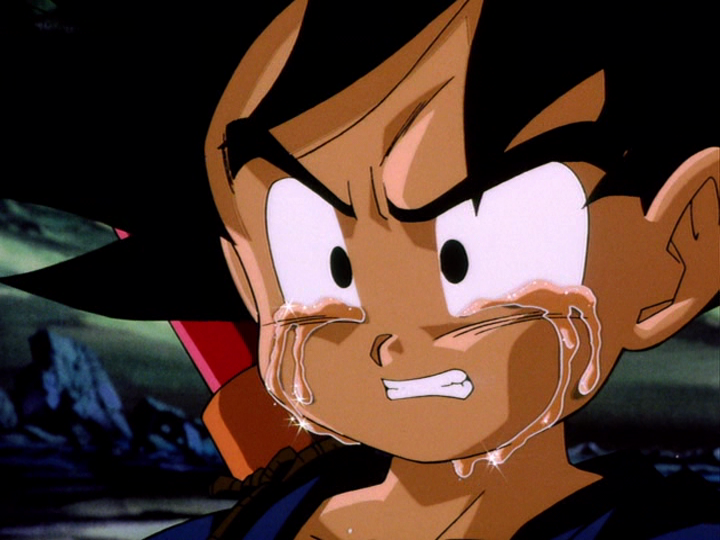 Goku begins to sob uncontrollably at the loss of his friend. 