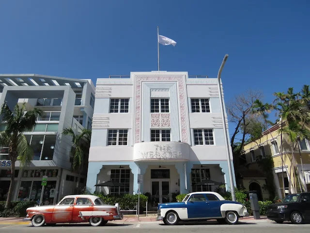 Art Deco Building in Miami South Beach with classic cars out front
