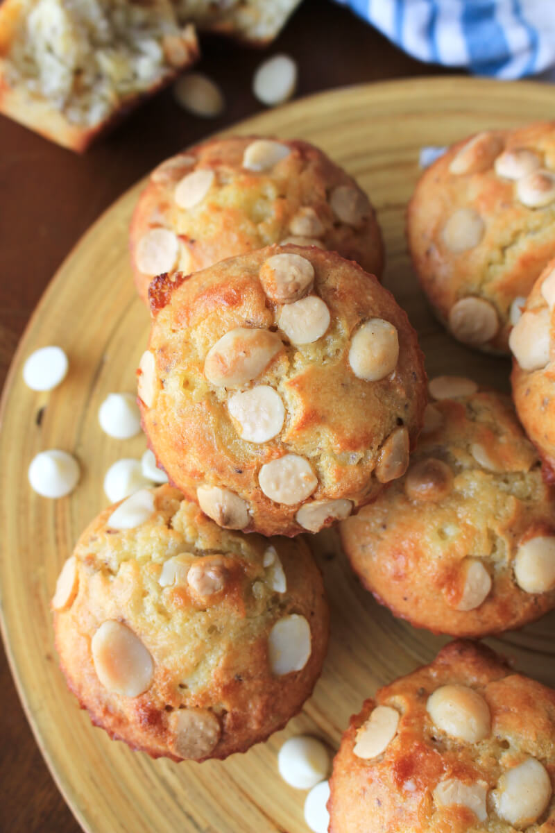 White Chocolate Macadamia Nut Muffins are the perfect grab and go breakfast or snack.  Pair with a glass of iced coffee and some Greek yogurt for a protein-packed treat that will boost your morning mood and re-energize your day! #perfectpickmeup #ad