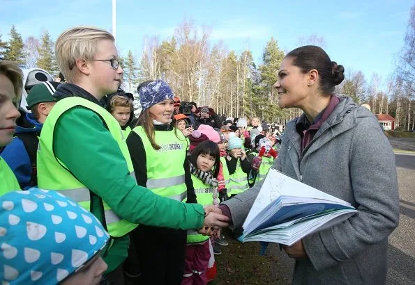 Crown Princess Victoria hiking of 2017 in Glaskogen Nature Reserve Värmland. Victoria wore wool coat fashion