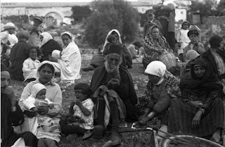 Jews gathered at Shimon Hatzaddik's tomb in Sheikh Jarrah, Jerusalem (Central Zionist Archives, Harvard Library, c. 1930)