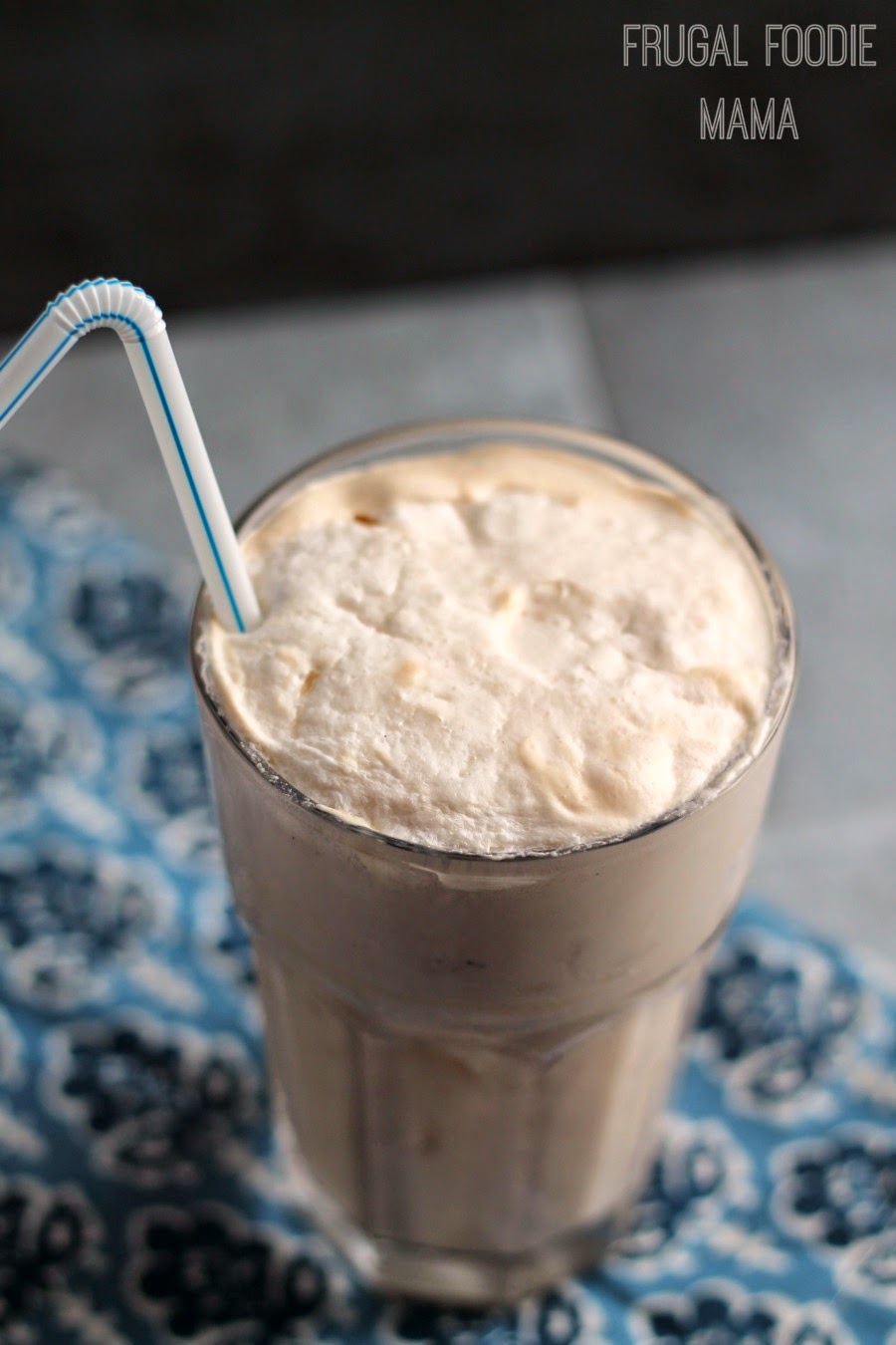 Made simply with Kahlua, whipped cream, pure vanilla bean paste, and a little club soda, this creamy Kahlua Vanilla Cream Soda is just pure bliss #VanillaWeek