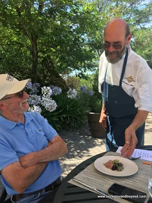 Chef Matthew Lowe delivers duck breast course for paired tasting at Kendall-Jackson Wine Estate & Gardens in Fulton, California