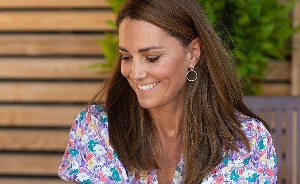 Kate Middleton wore a new pastel floral pattern dress by Faithfull the Brand, Russell and Bromley wedges, Accessorize hoop earrings