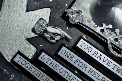 Black and white mixed media layout with prima, wild orchid flowers, buttons, distressing, mixed media, cheesecloth, prills and die cuts. 