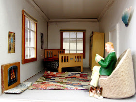 Spare room of an Art Deco moderne-style dolls house by Anne Reid