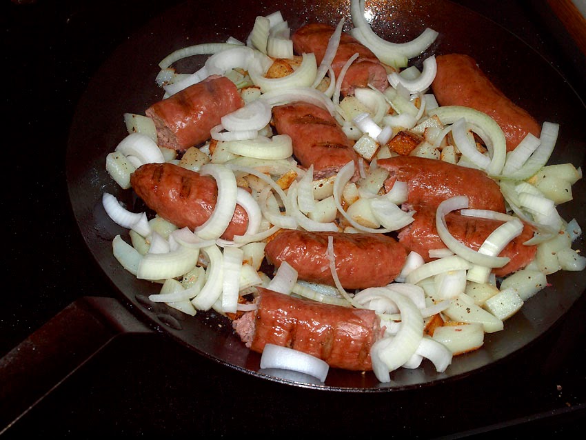 Pellet Smoker Cooking Polish Sausage, Cabbage, Potato and Onion Skillet