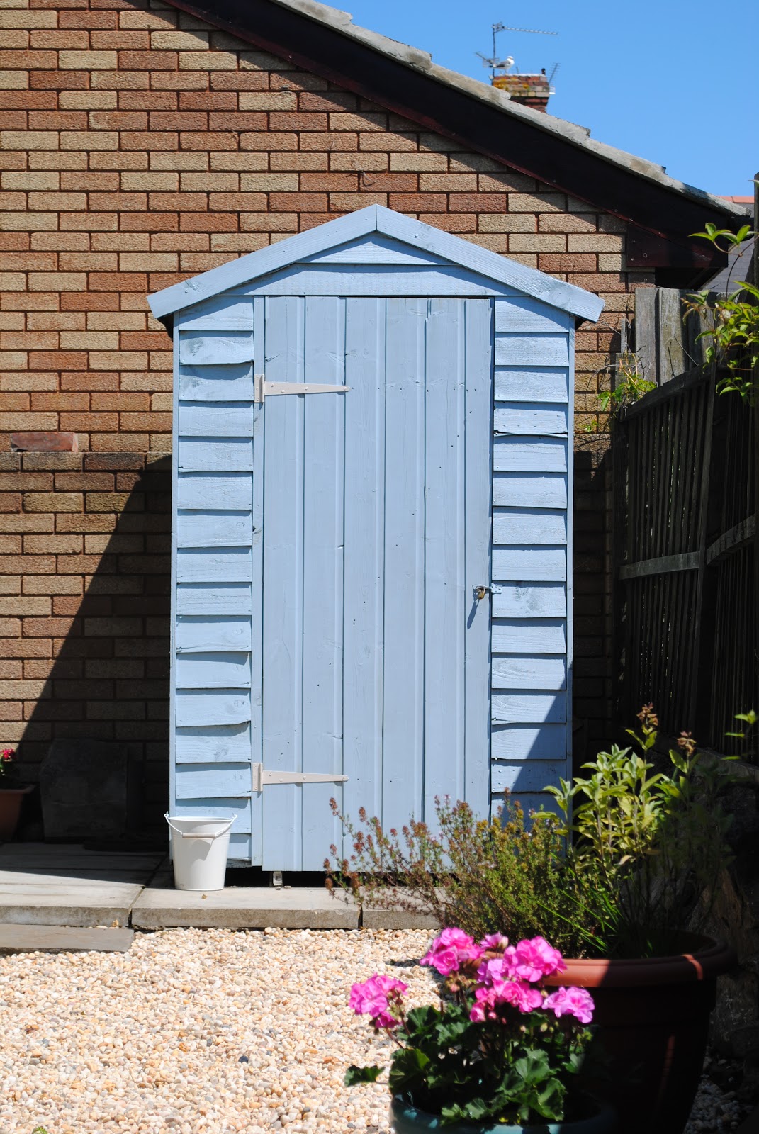 beautiful square feet Our pretty blue shed.