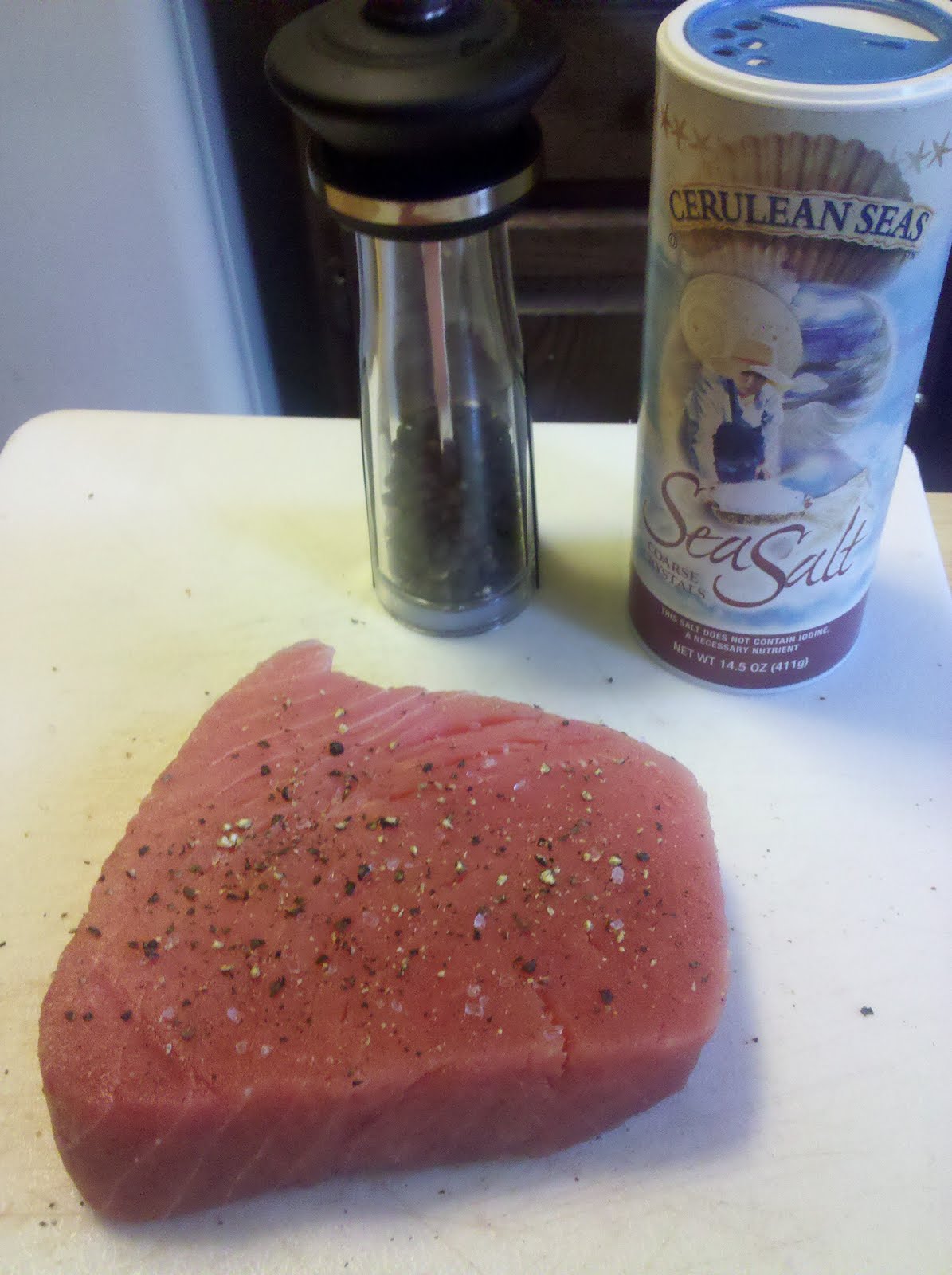 the existential chef Tuna steaks au poivre with french onion sauce and garlic scapes